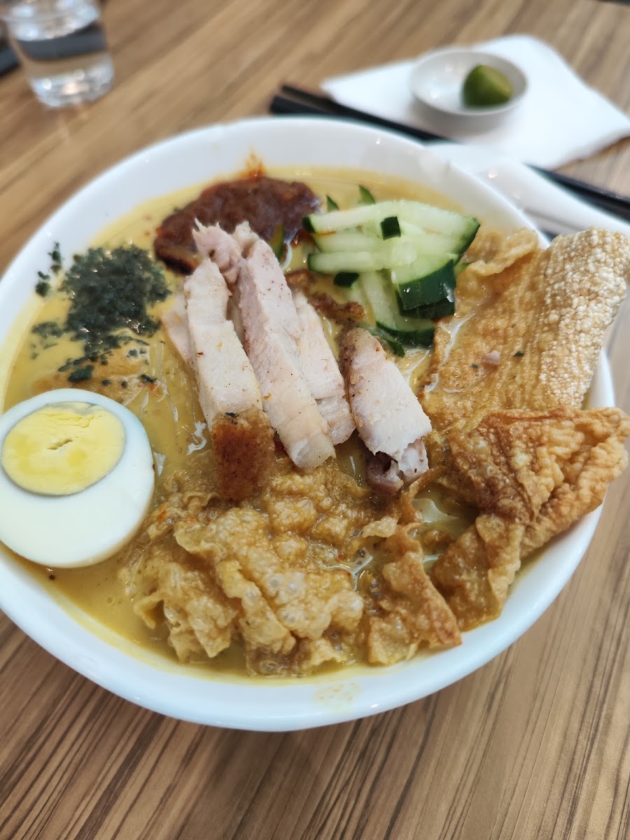 Hearty curry noodle bowl served fresh at Kafe Wake Me Up
